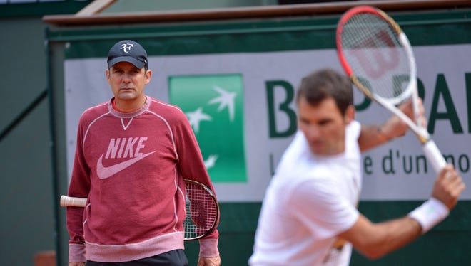 Paul Annacone con Roger Federer