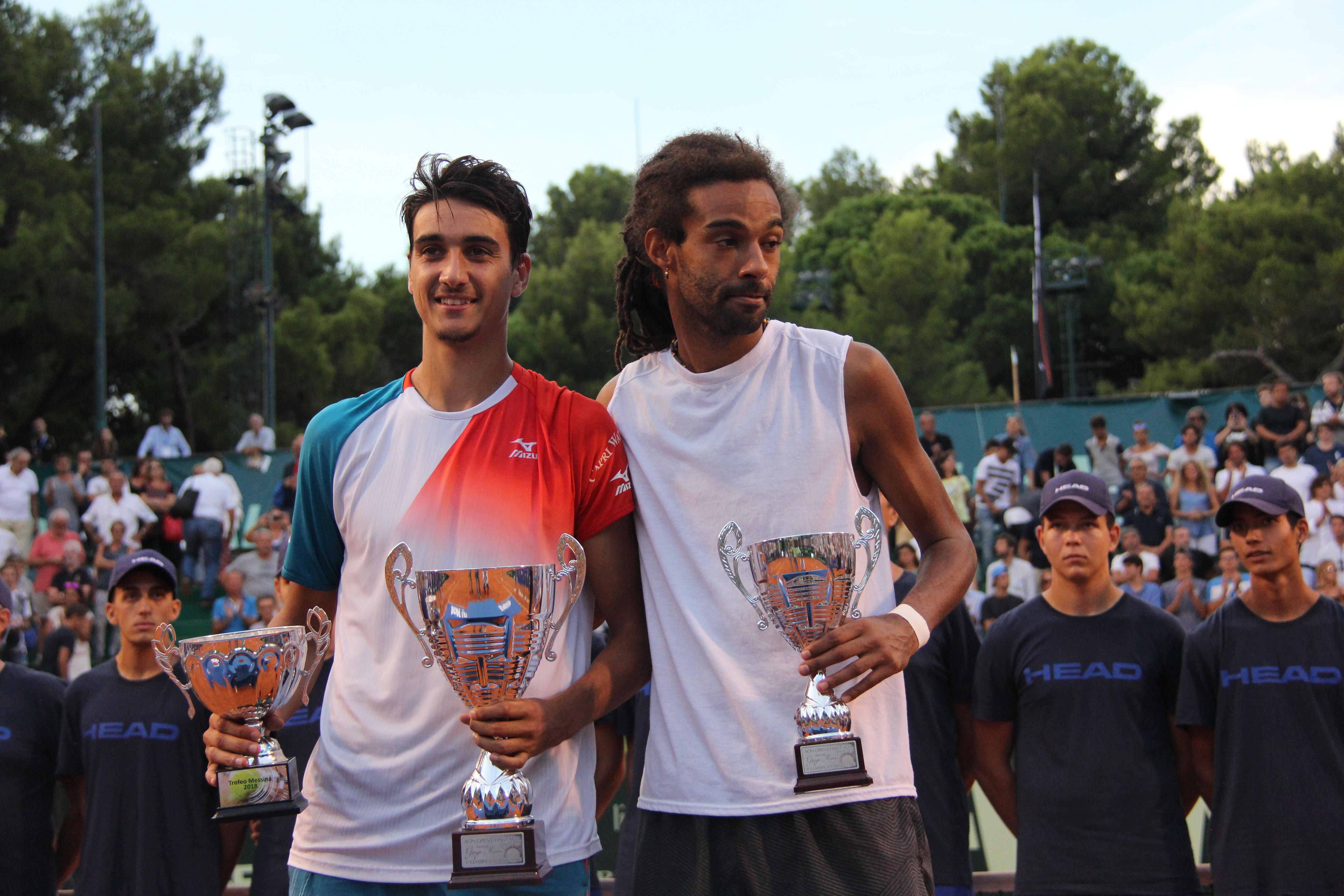 la foto di Lorenzo Sonego a sinistra vincitore della passata edizione e del finalista Dustin Brown