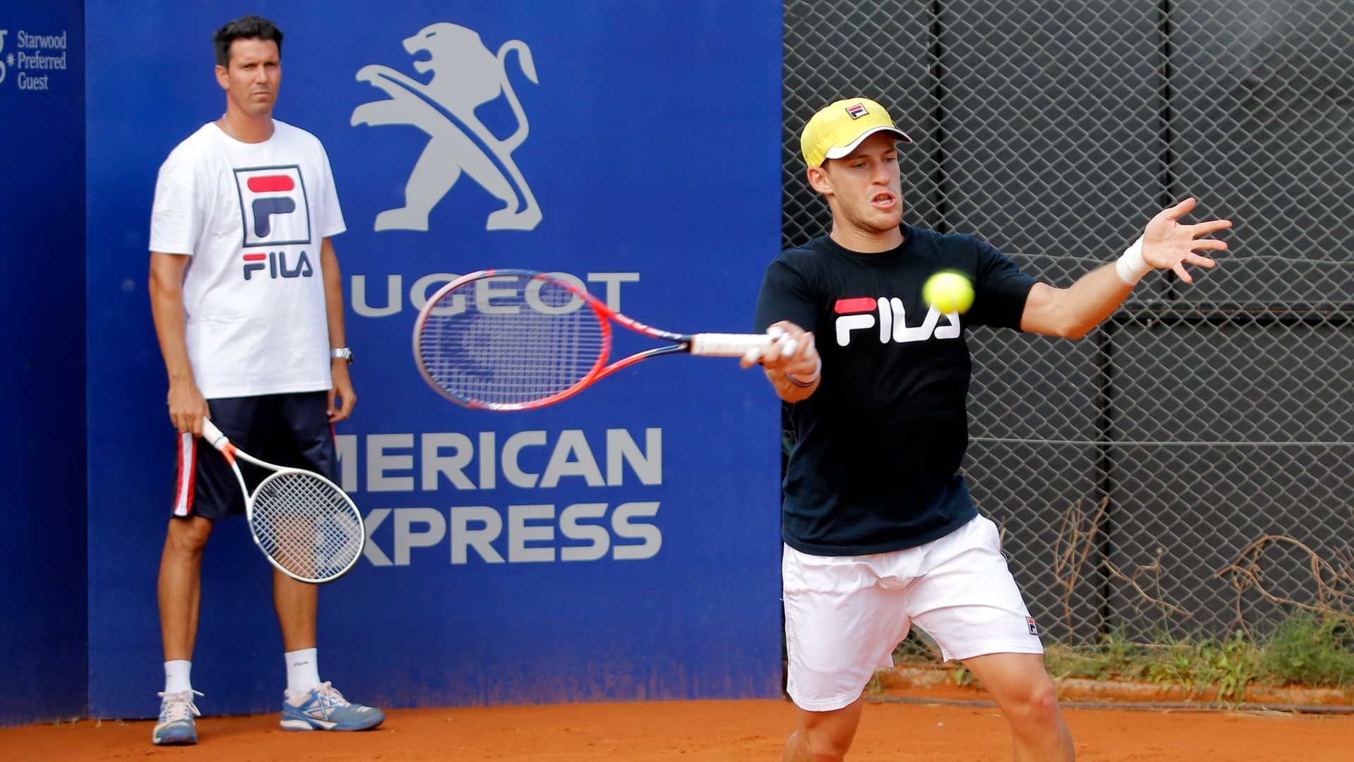 Juan Ignacio Chela in campo con Schwartzman