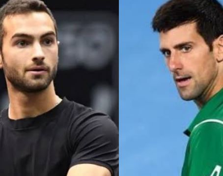 Noah Rubin e Novak Djokovic nella foto