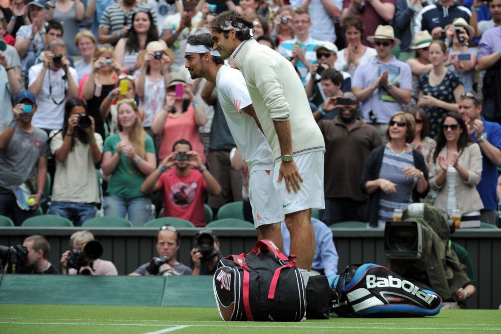 Fabio Fognini e Roger Federer nella foto