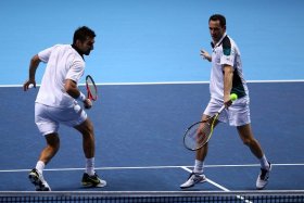 Michael Llodra impegnato nella Masters Cup di doppio