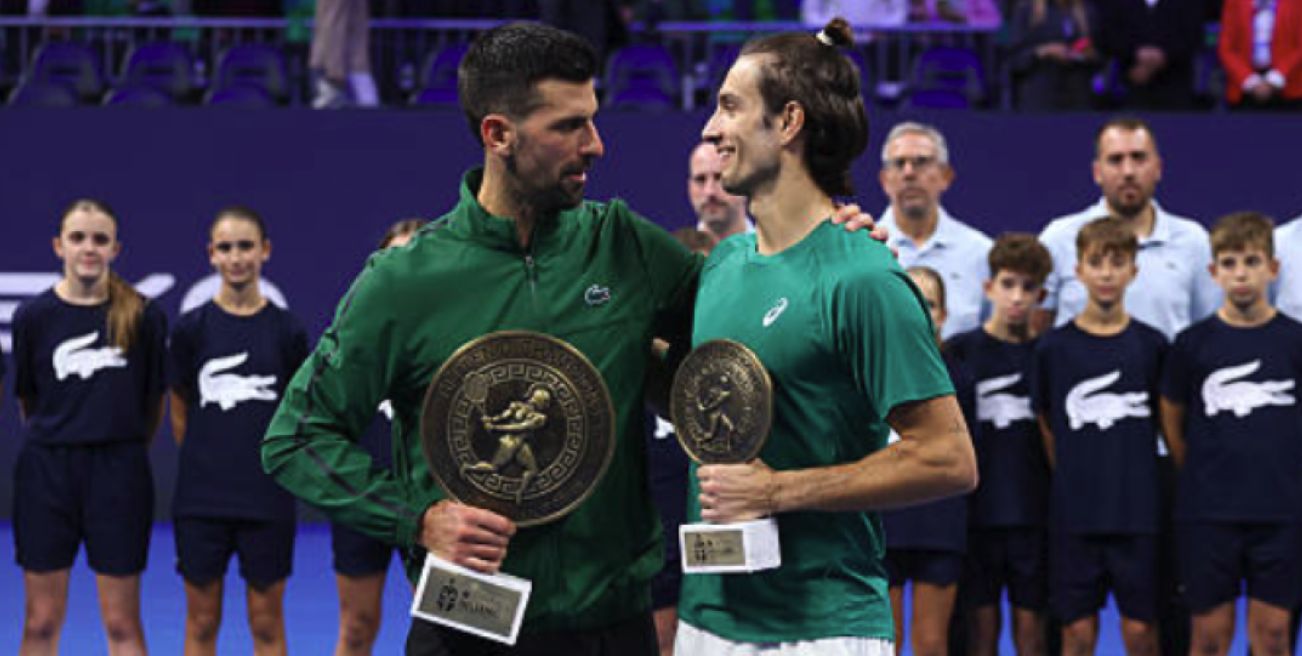 Novak Djokovic con Lorenzo Musetti - Foto Getty Images
