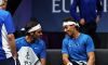 Novak Djokovic e Roger Federer si congratulano con Rafael Nadal